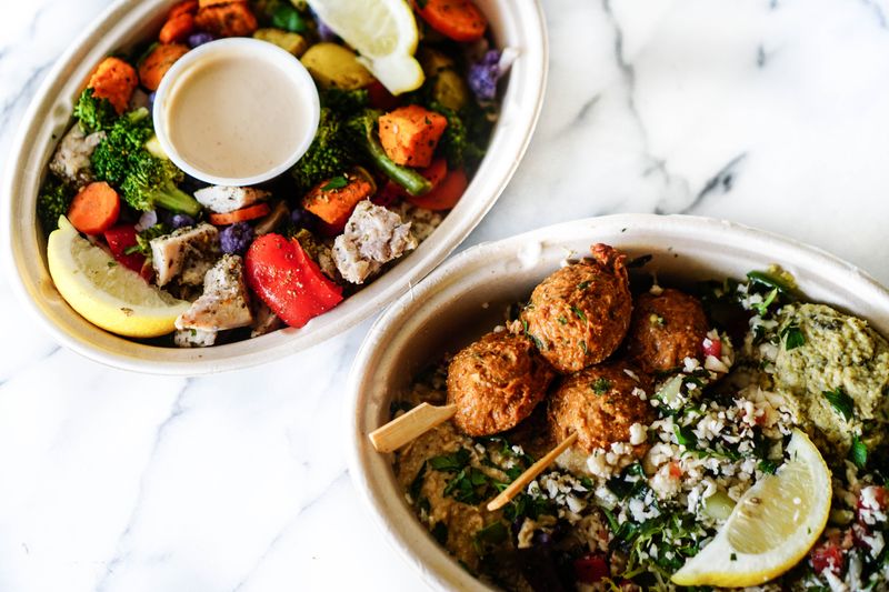 Buddha bowl with roasted vegetables and hummus