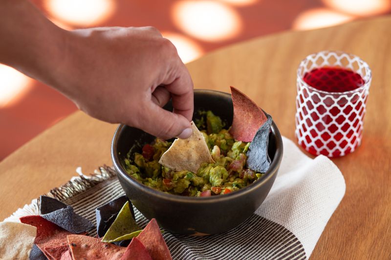 Fresh guacamole with tortilla chips